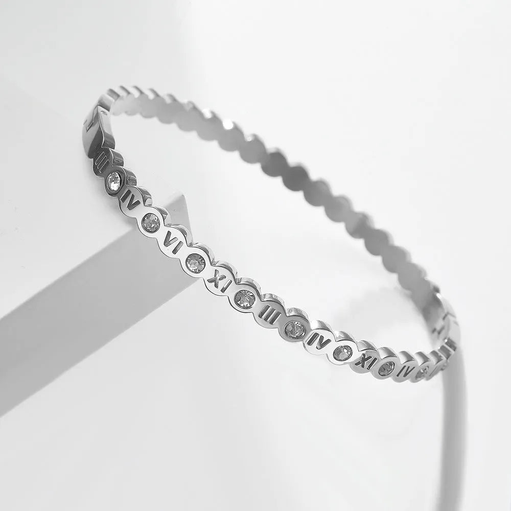 Korean style titanium steel bracelet with number charms in steel, gold or rose gold colour