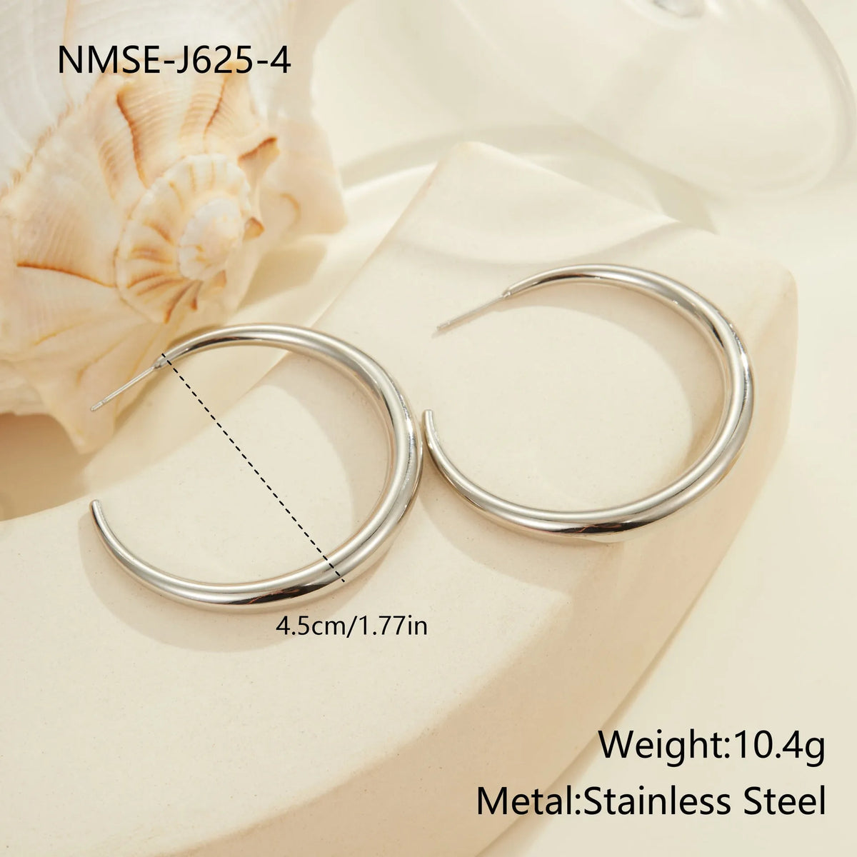 Simple geometric round hoop earrings in gold and steel finish made of stainless steel with 18K PVD plating