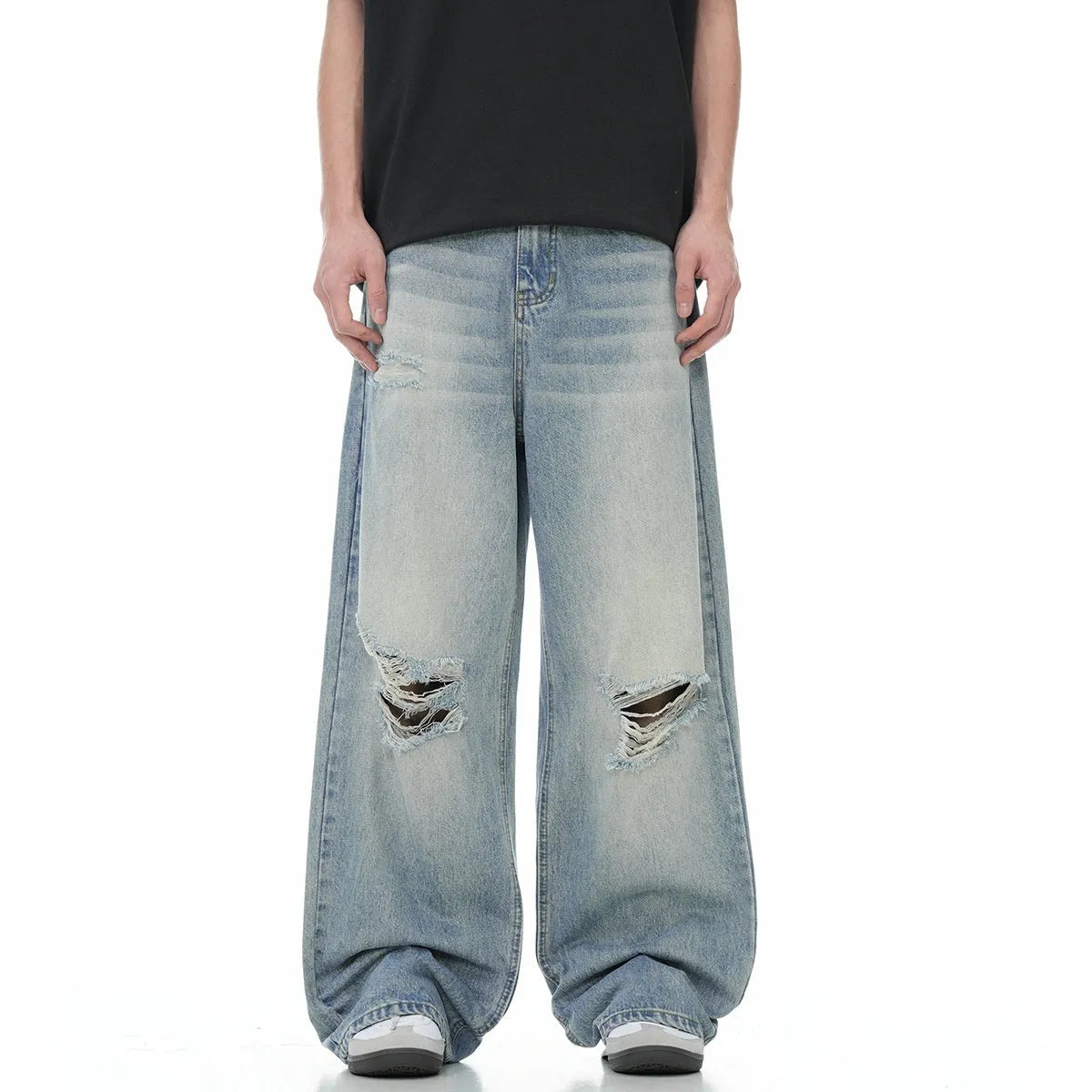 Blue men's straight-leg ripped jeans on a plain background showing cotton blend fabric and zipper fly.