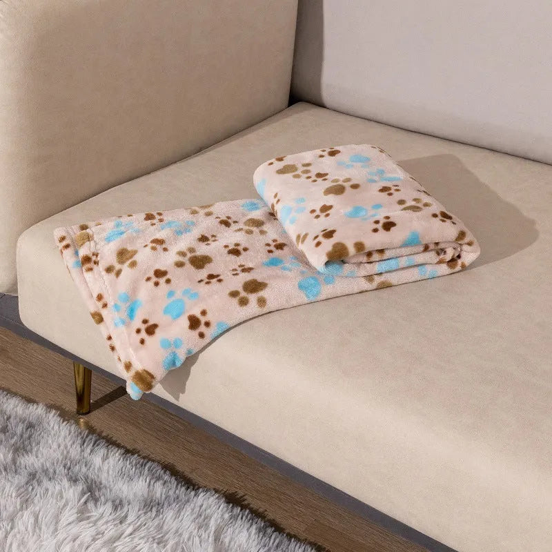 Cartoon print pet blanket in blue dog design showing double-sided thickened flannel construction