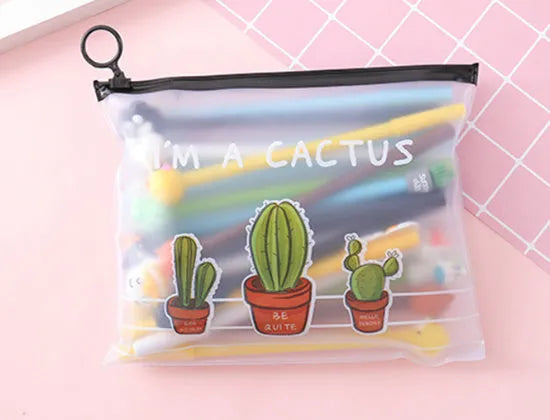 Open plastic case showing twenty 0.5mm black gel pens with cartoon cactus designs for boys and girls.