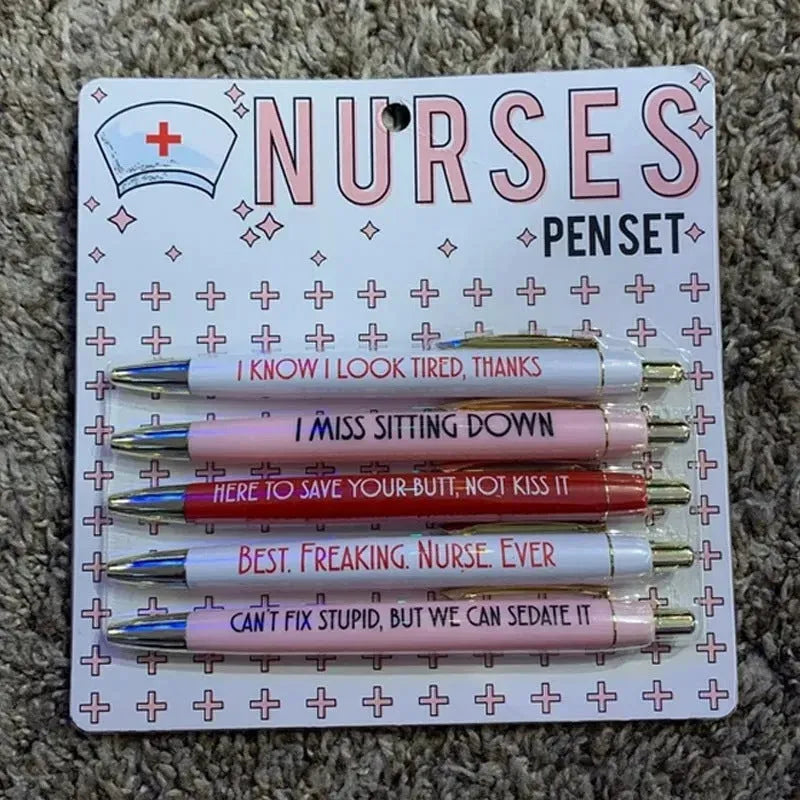 Five nurse-themed retractable ballpoint pens with medical motif designs arranged together