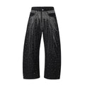 Blue loose-fitting wide-leg cotton trousers laid flat, showing the high street casual style.