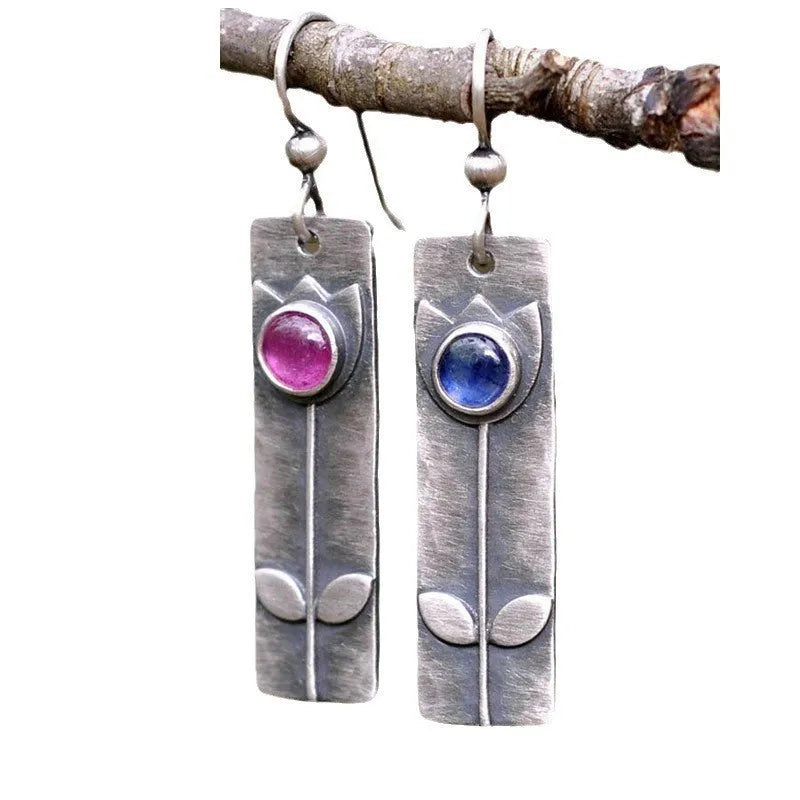 Antique finish red sapphire earrings with geometric ellipse design in retro style