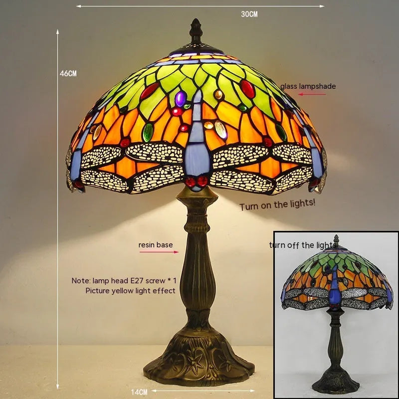 Stone table lamp with Tiffany-style blue dragonfly design on base