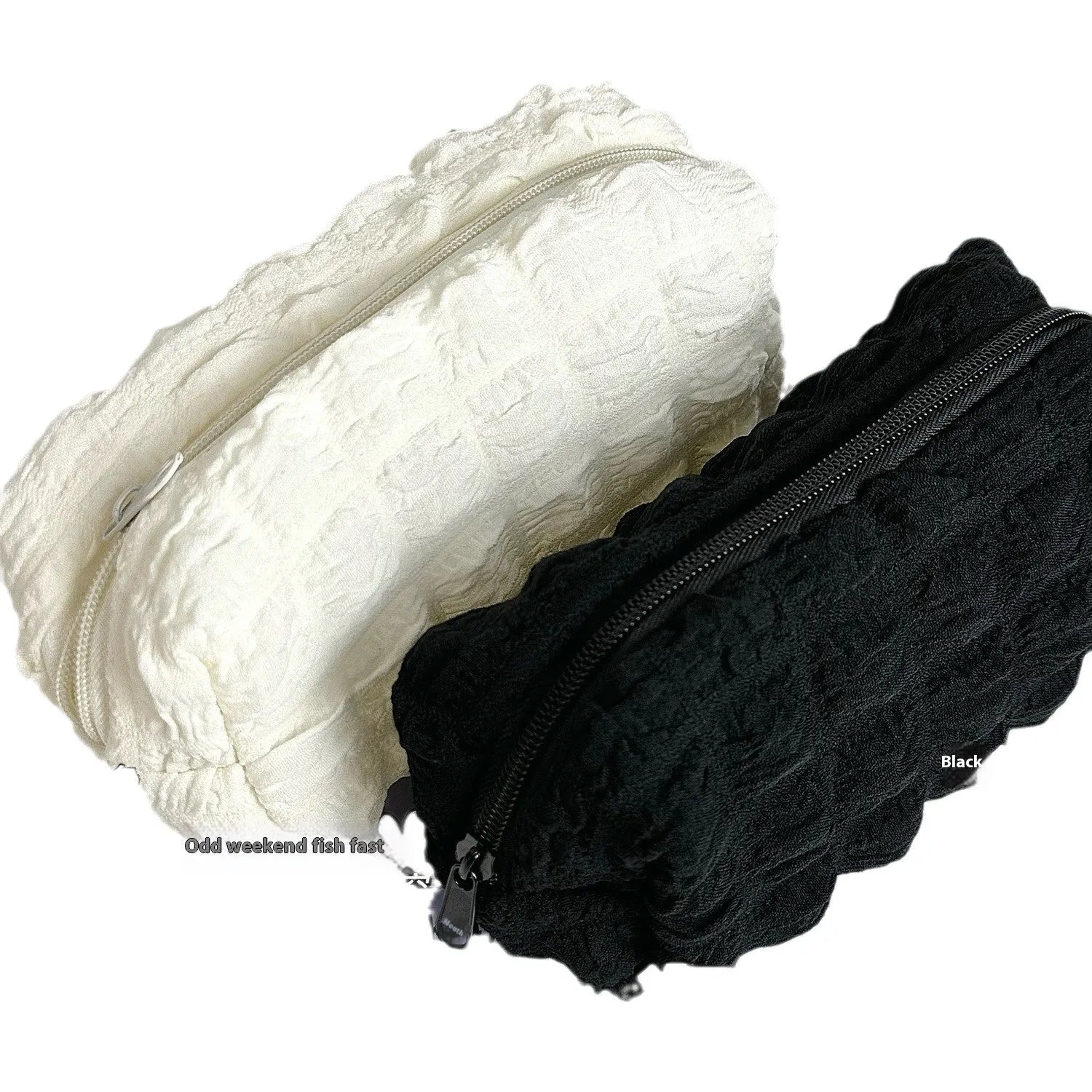 Beige or black polyester fabric pencil case with cream puff style texture and zip closure