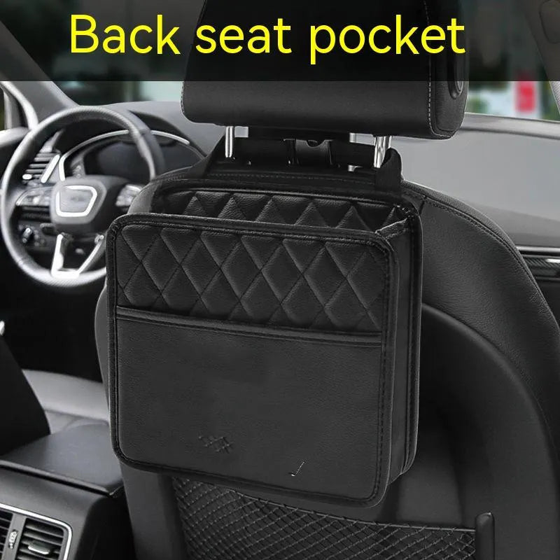 Black leather car hanging storage bag with 25cm dimensions shown installed on vehicle headrest