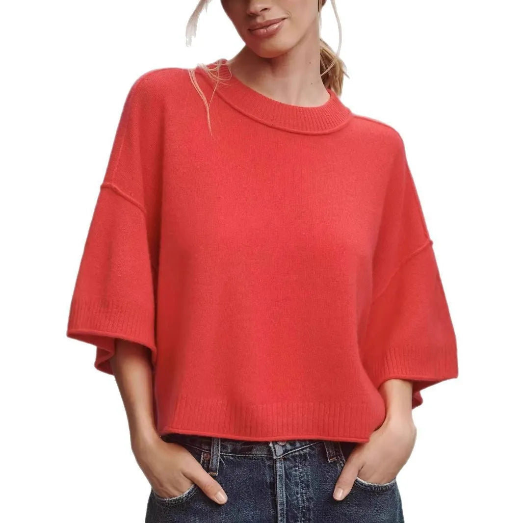 Red cropped T-shirt with exposed navel detail on mannequin