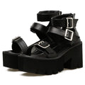 Black women's platform sandals with thick sole, chunky heel, buckle straps and round toe in Harajuku punk style