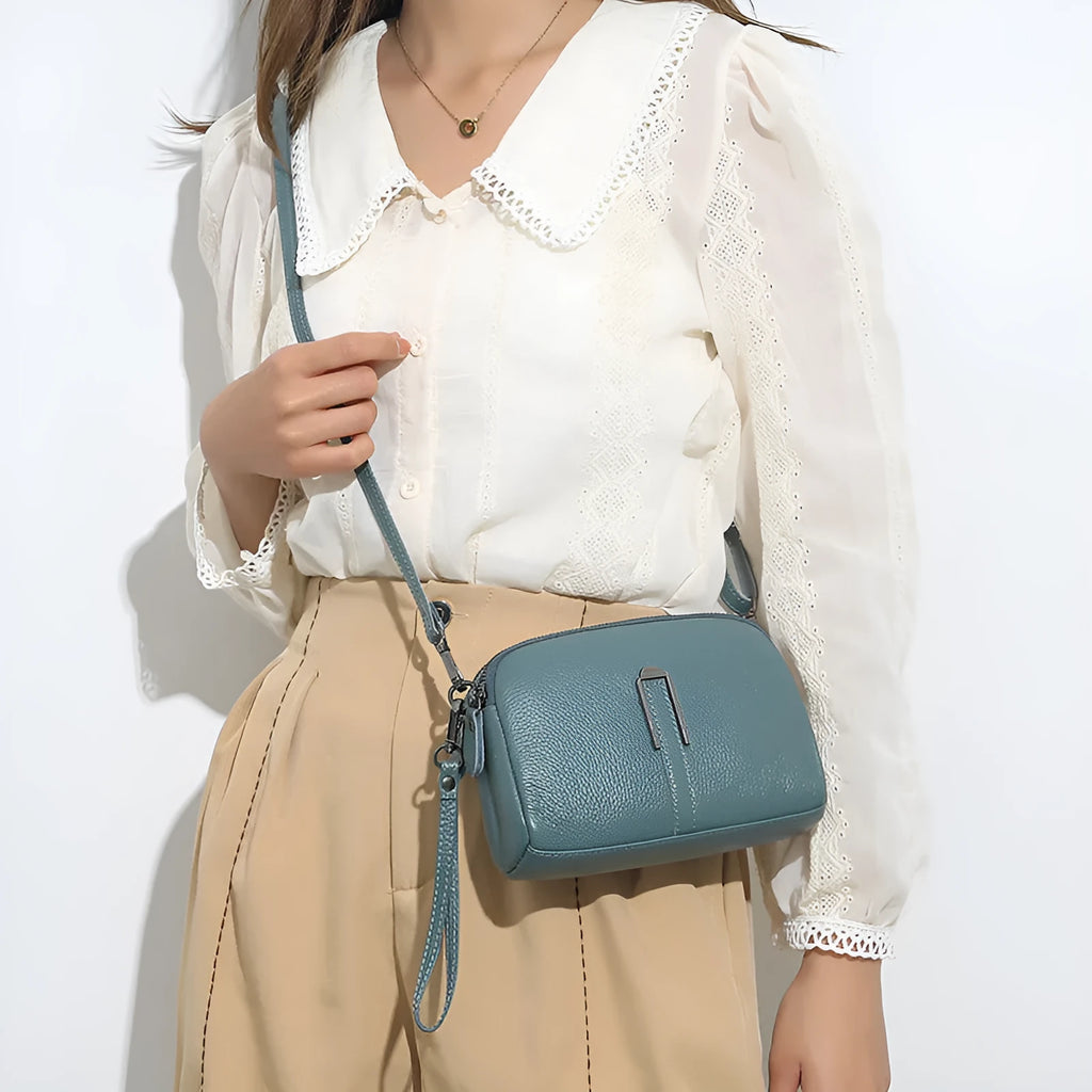 Women's genuine leather shoulder bag in horizontal square shape showing five colour options