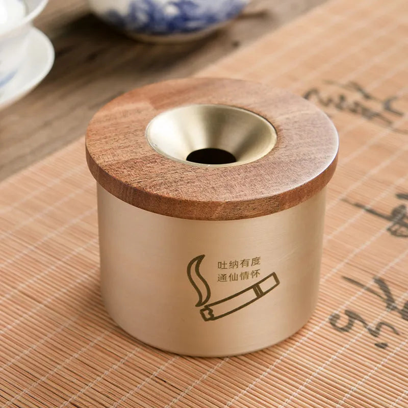 Retro solid copper ashtray with a wooden lid showing the centre hole.