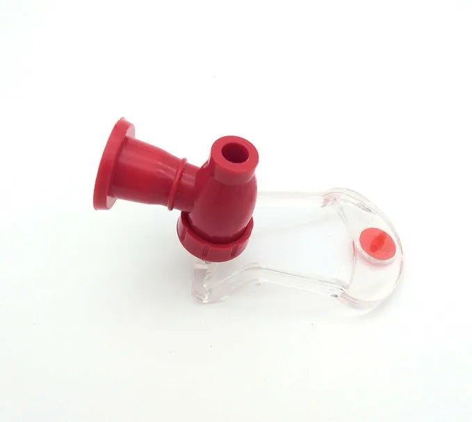 Red Magic Tap soda dispenser attached to 2-litre bottle with push-in mechanism for drink serving