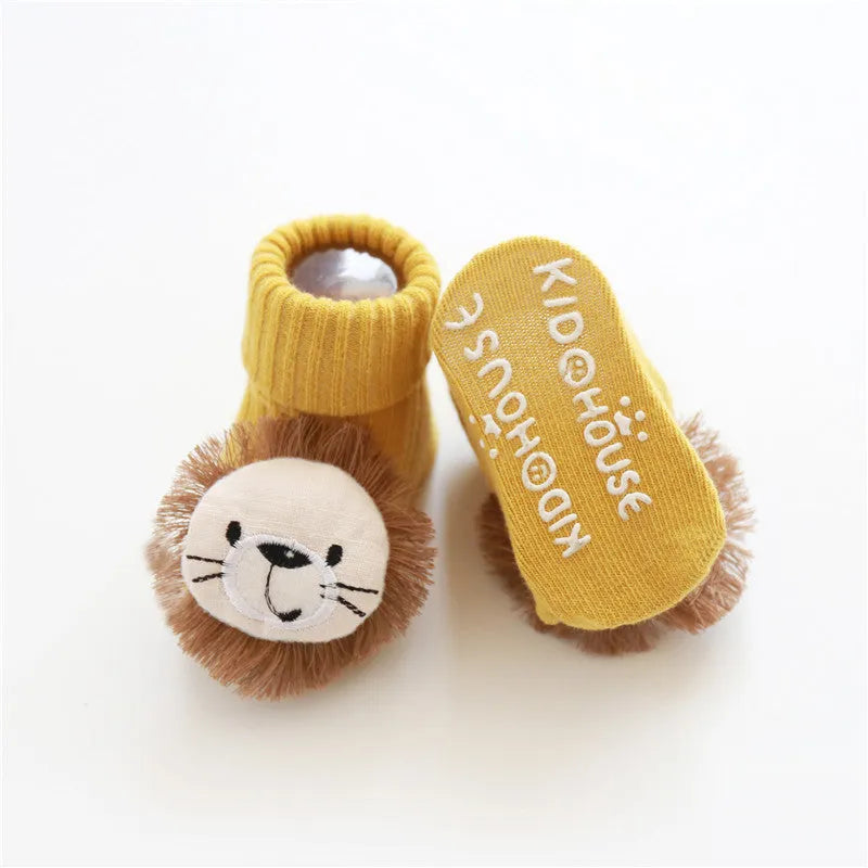 Cotton baby floor socks in a selection of colours and patterns like panda, lion, and bows, shown in sizes for infants.