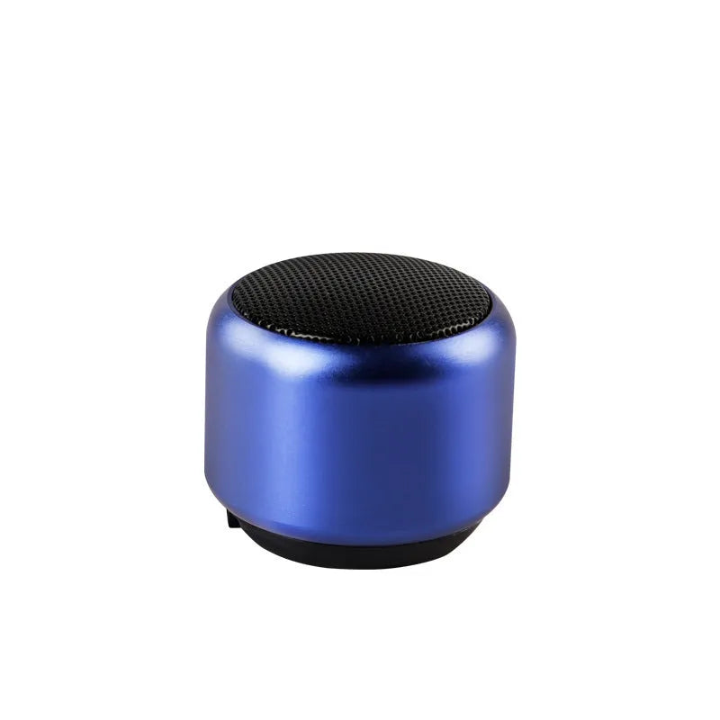 Small portable Bluetooth wireless speaker shown in black, blue, gold, and pink colour options