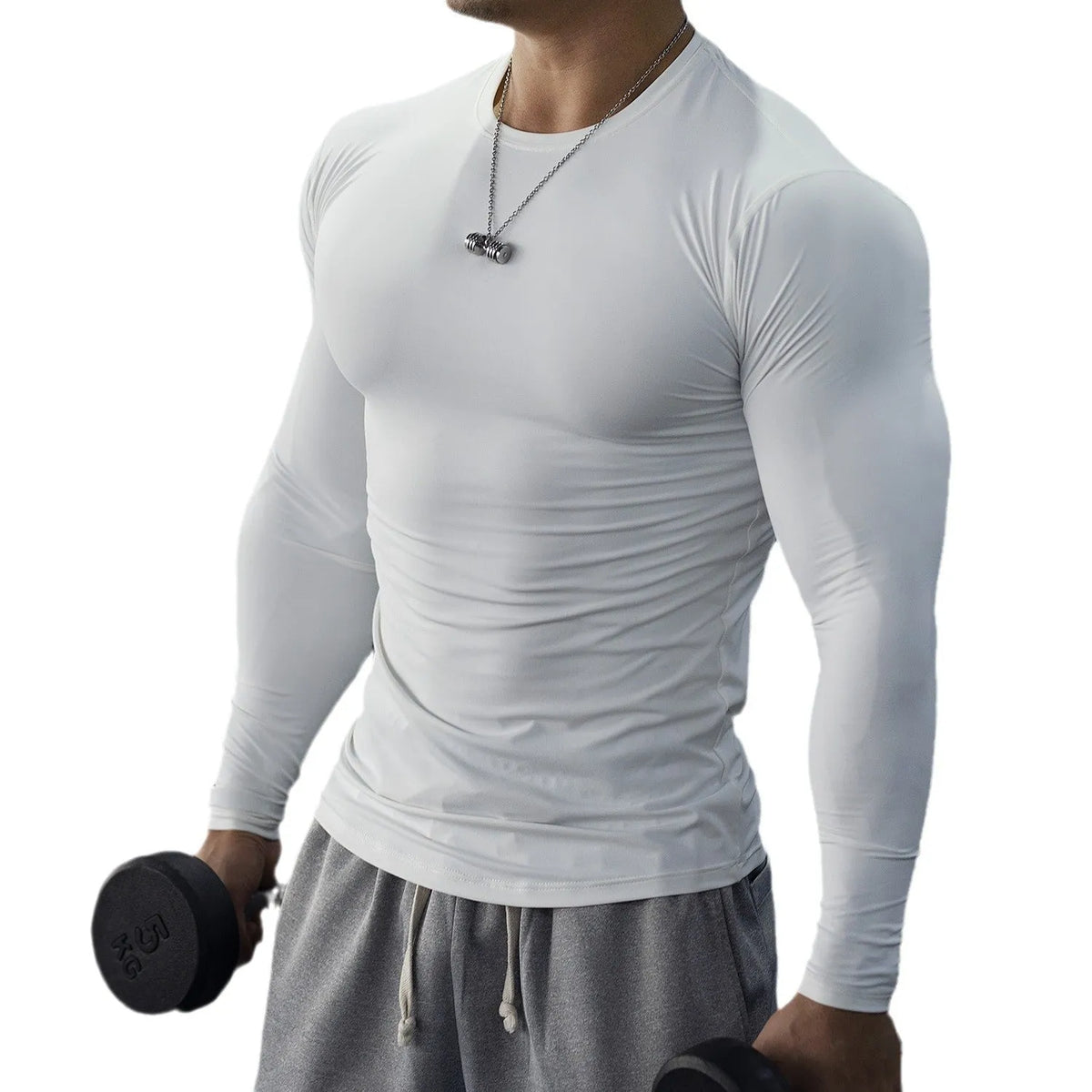 Men's black fitness tights with long sleeves and slim fit design for exercise