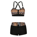 Women's floral print bikini swimsuit with high-waisted briefs on a mannequin.