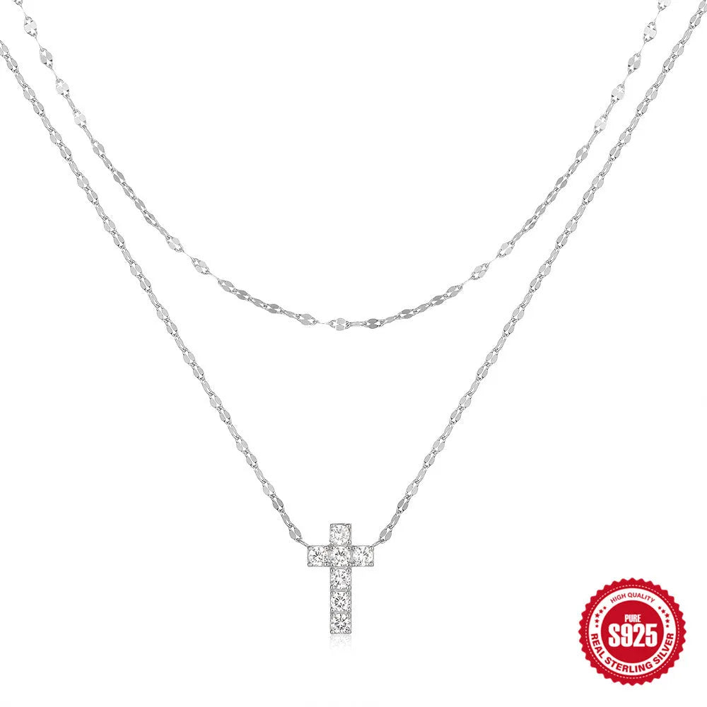 S925 sterling silver double layer twin diamond cross pendant necklace on a clavicle chain.