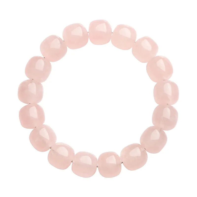 Pink bamboo crystal barrel bead bracelet with geometric design on wrist