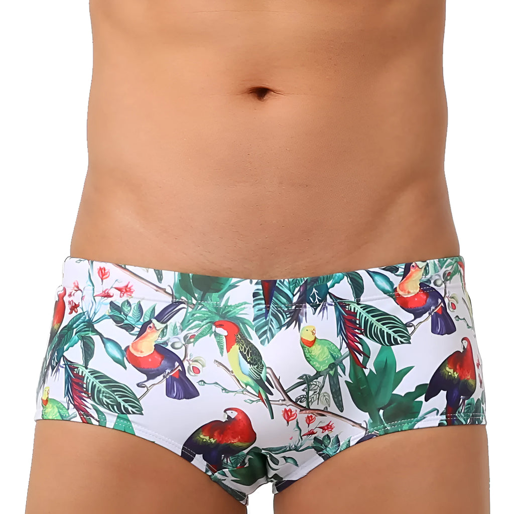 Men's floral bird print nylon swim trunks in boxer style on white background