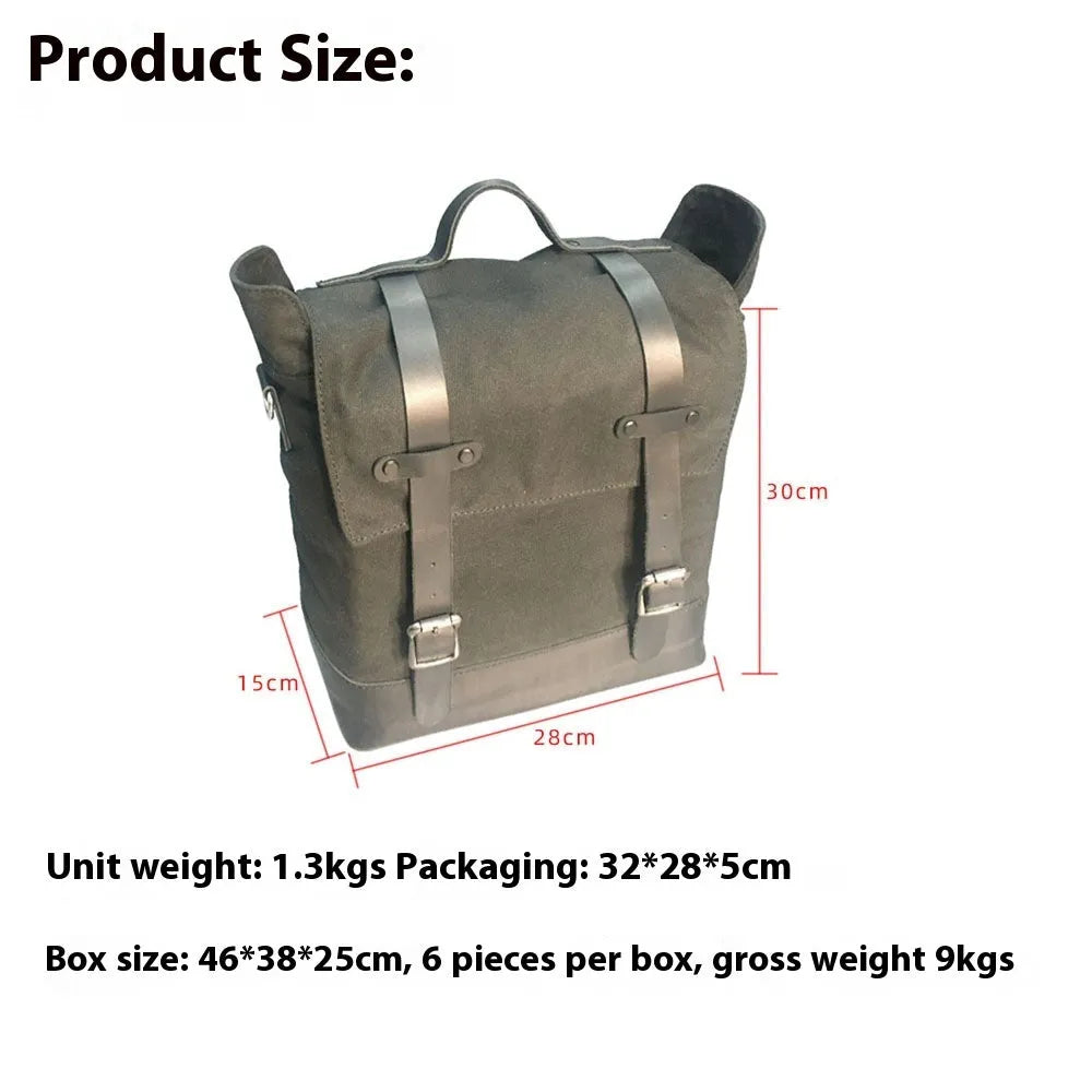 Black waterproof canvas motorcycle side bag with cowhide details mounted on motorcycle