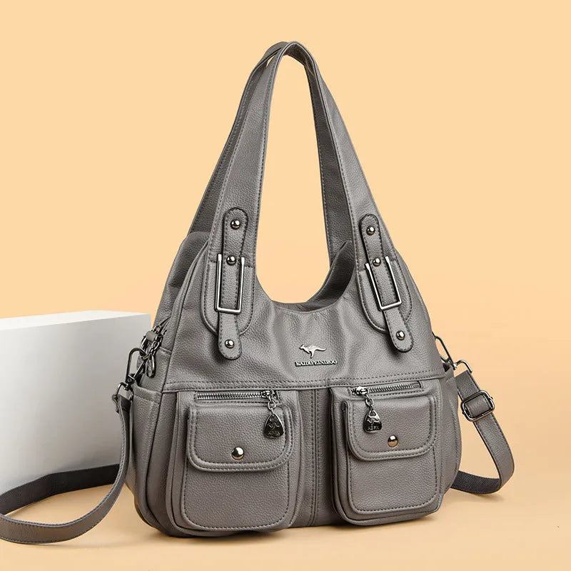 Heart-shaped crossbody handbag in soft PU with slit pocket and six colour options