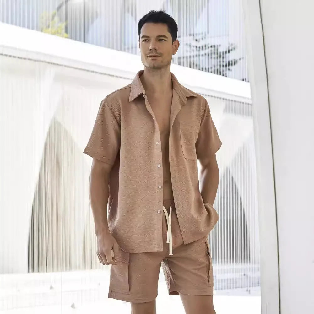 A woman's casual two-piece set featuring a short-sleeve top and elastic waist shorts in a neutral colour.