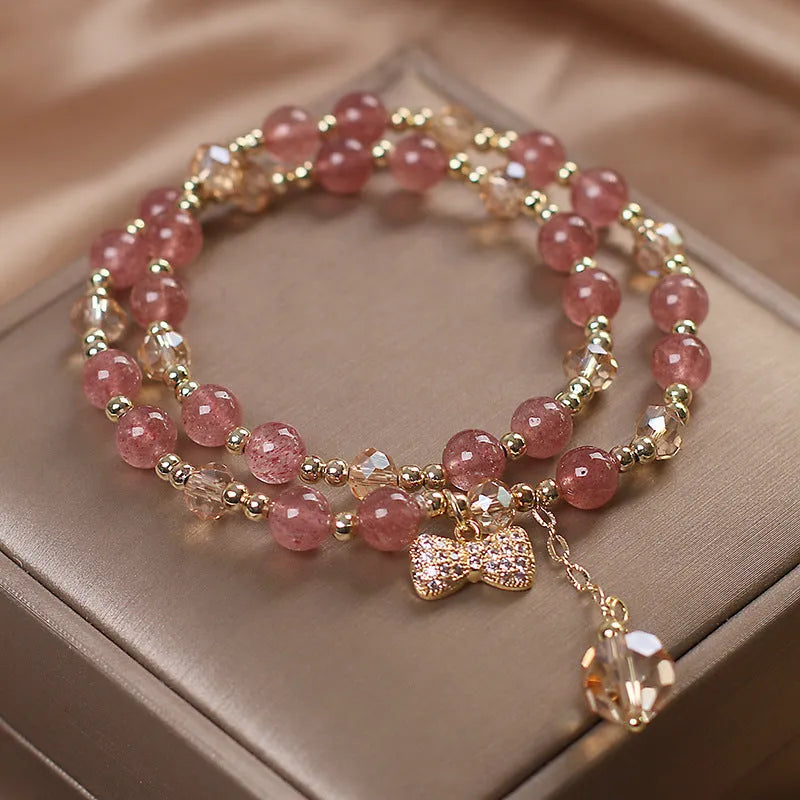 Double layer crystal bracelet with lucky cat charms and red cat's eye flower beads