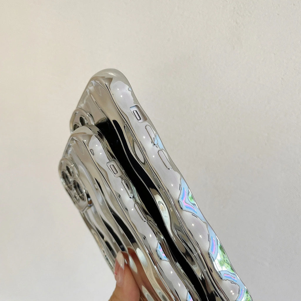Electroplated wave stripe design on a flexible TPU iPhone 17 protective case in silver finish.
