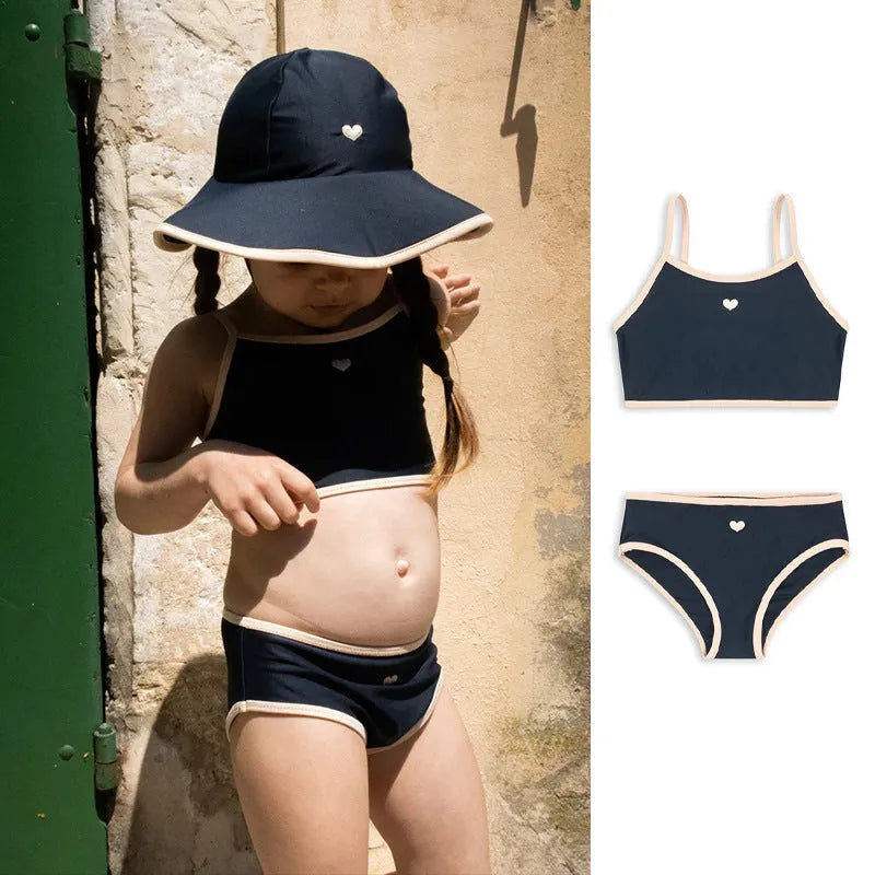 Dark blue split girl's swimsuit with briefs-style design for swimming and wading activities