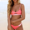 Women's black and white dot bikini set and red and white stripe bikini set for swimming.