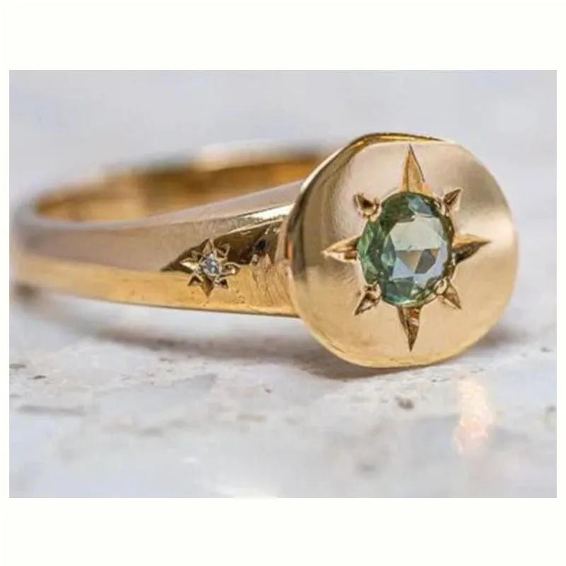 Golden adjustable ring with oval asterism zircon and star micro inlay design