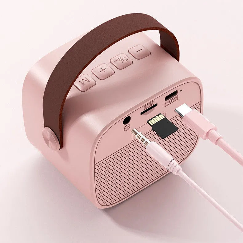 Compact portable Bluetooth speaker with microphone in blue, pink, or white colour options