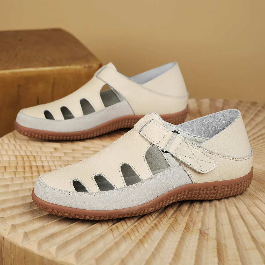 Women's plus size flat heel sandals with hollow toe cap design in blue colour showing thick rubber sole