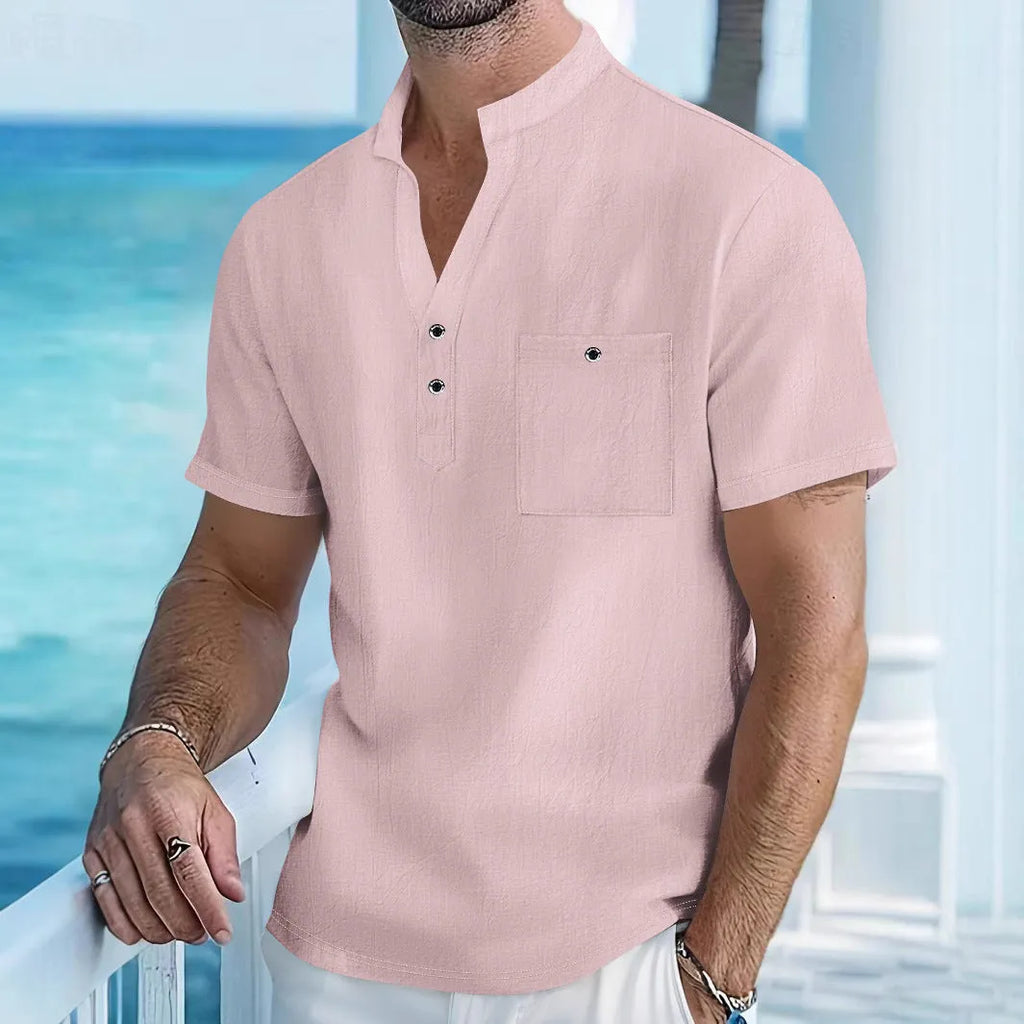 Men's light blue linen blend short sleeve t-shirt with a stand collar, shown in a loose fit.