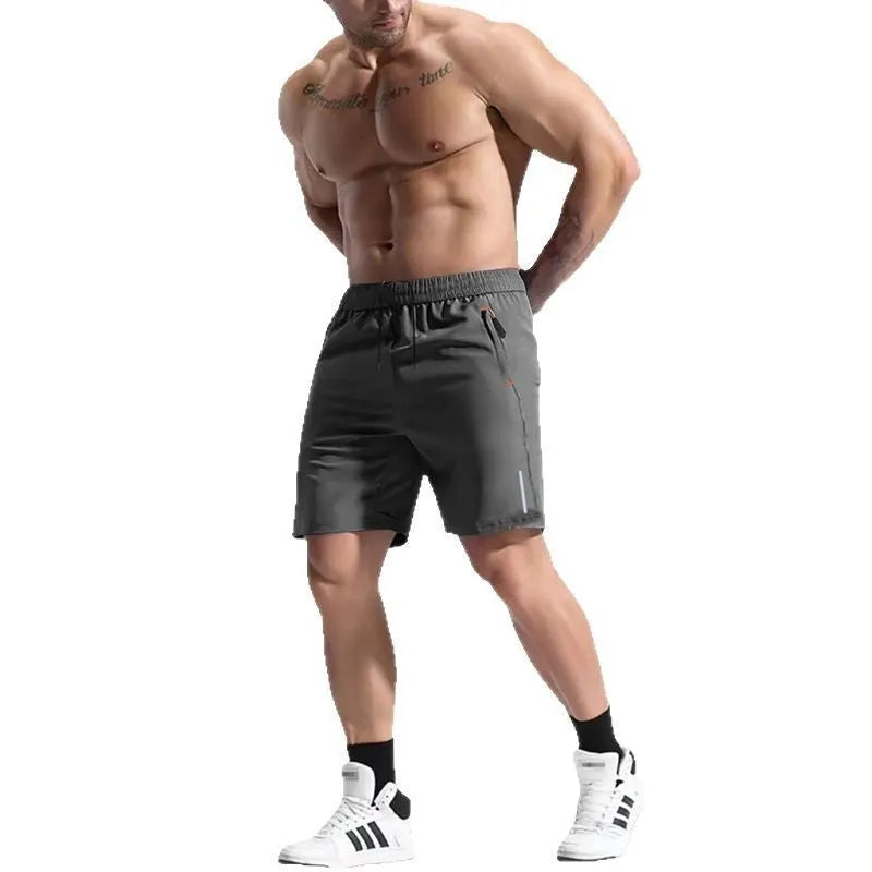 Men's grey elastic waist sports shorts made from bamboo and polyester fabric with a drawstring closure.
