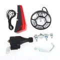 Silver bicycle dynamo-powered light generator kit for front fork or rear frame mounting.