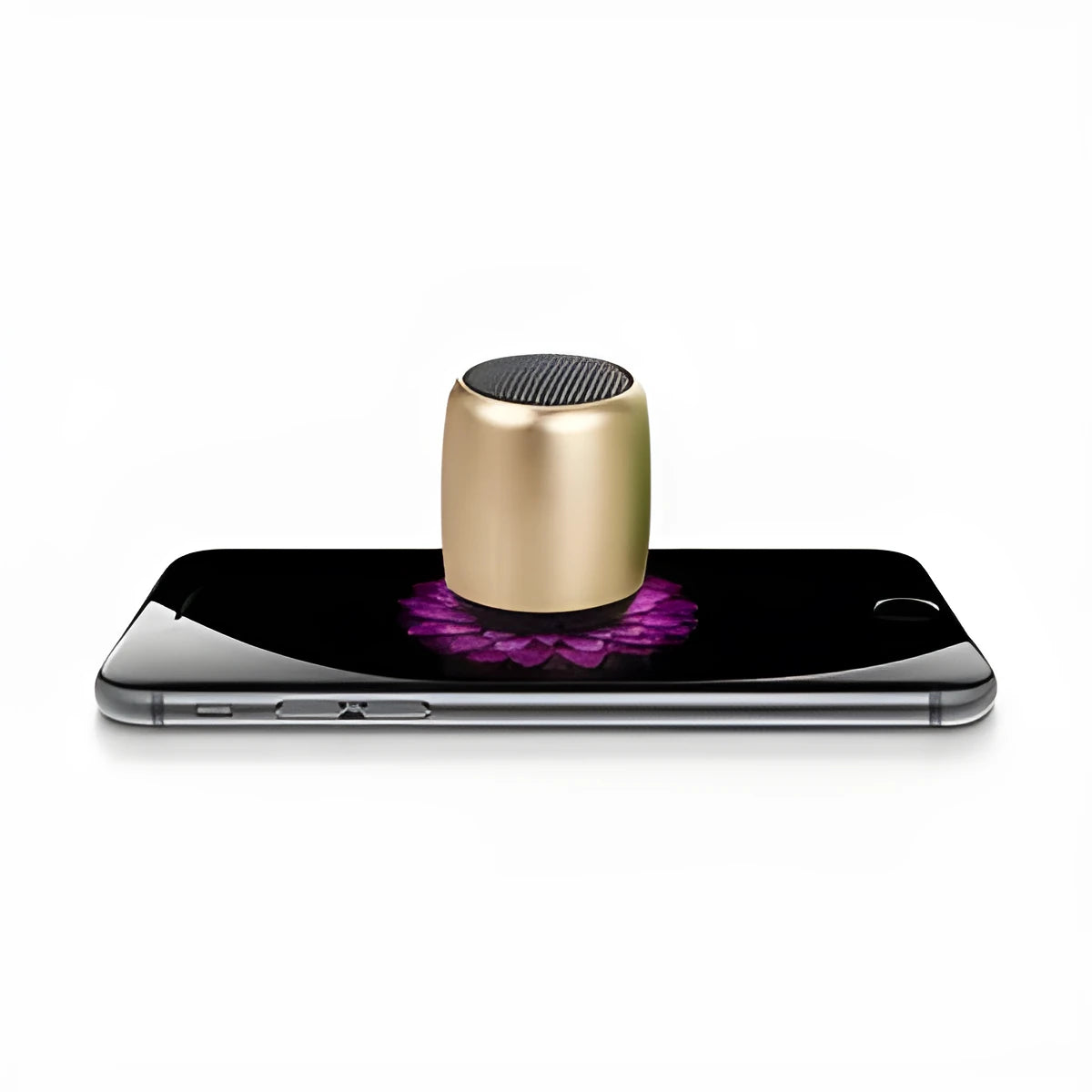 Small portable Bluetooth wireless speaker shown in black, blue, gold, and pink colour options