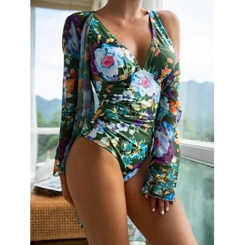 Women's floral print bikini three-piece swimsuit set in green, shown with a matching coat.