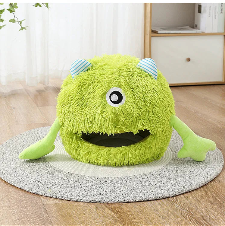Fluffy round pet bed for cats and small dogs on a wooden floor