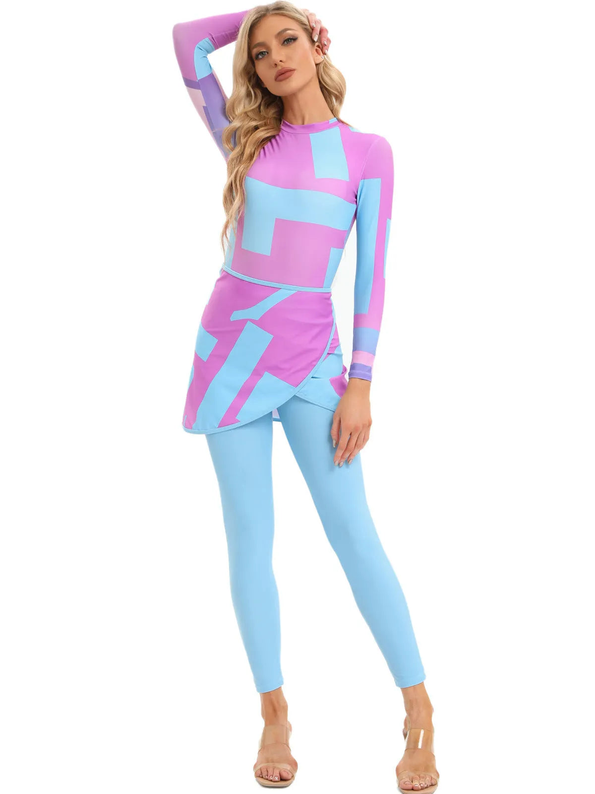 Muslim conservative three-piece swimsuit set with long sleeves and a matching apron in a blue print pattern.