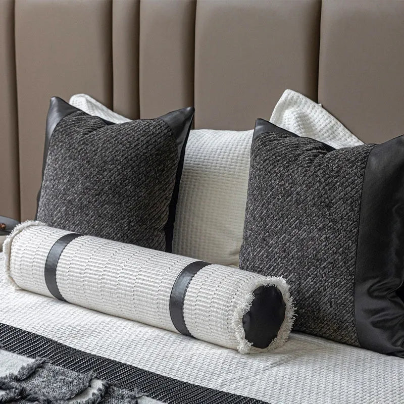 Modern minimalist polyester bed runner blanket set with round pillow and pillowcase on a bed.