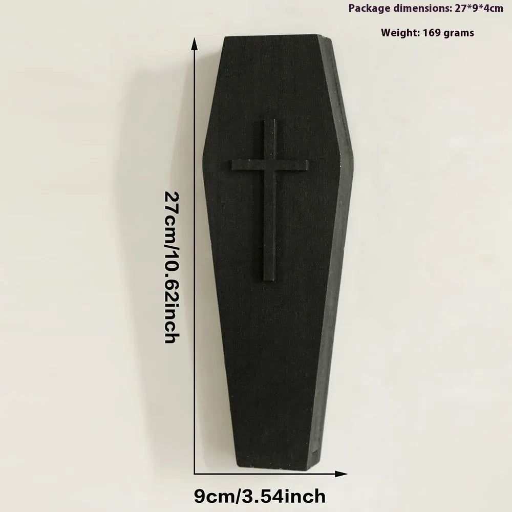 Black wooden cross wall shelf decoration with display ledge measuring 27 by 9 centimetres