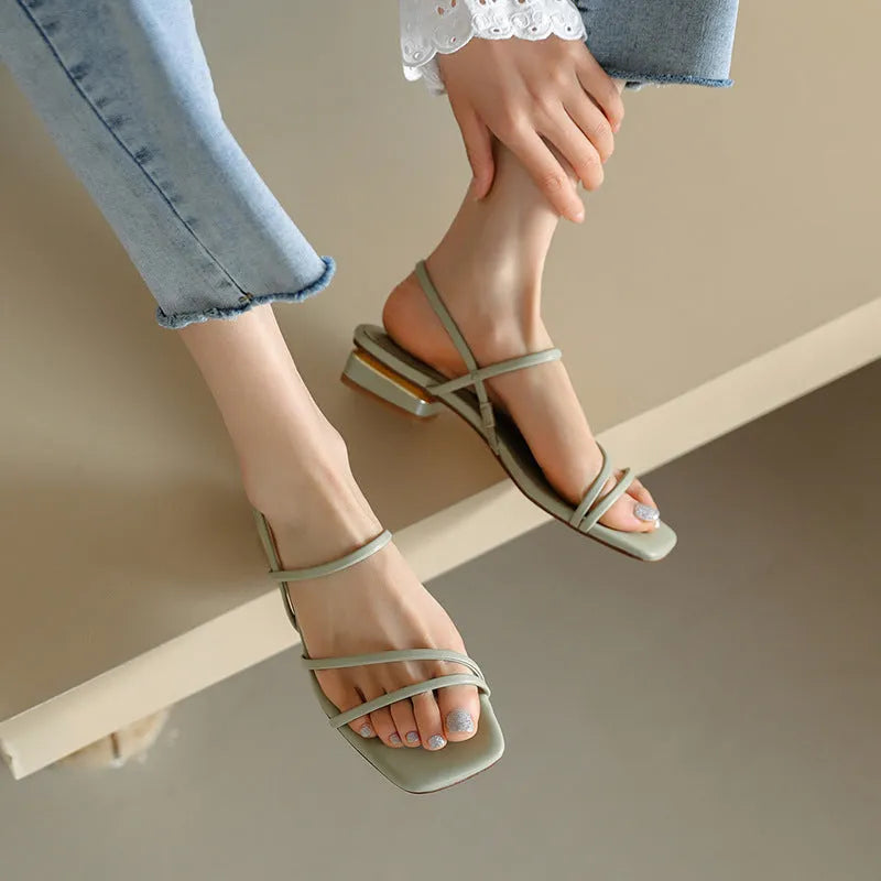 Women's flat strap Roman sandals with square toe in microfiber, shown in beige colour.