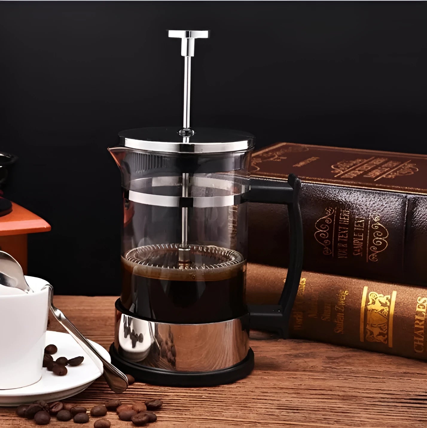 Glass French press coffee maker with stainless steel plunger showing 350ml capacity markings