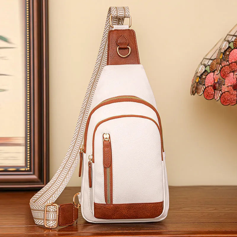 Small brown soft PU women's messenger crossbody bag with an open front pocket and decorative stitching.