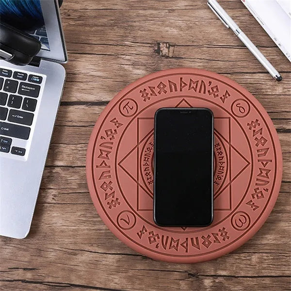 Square wireless charger with glowing magic array pattern design on desk