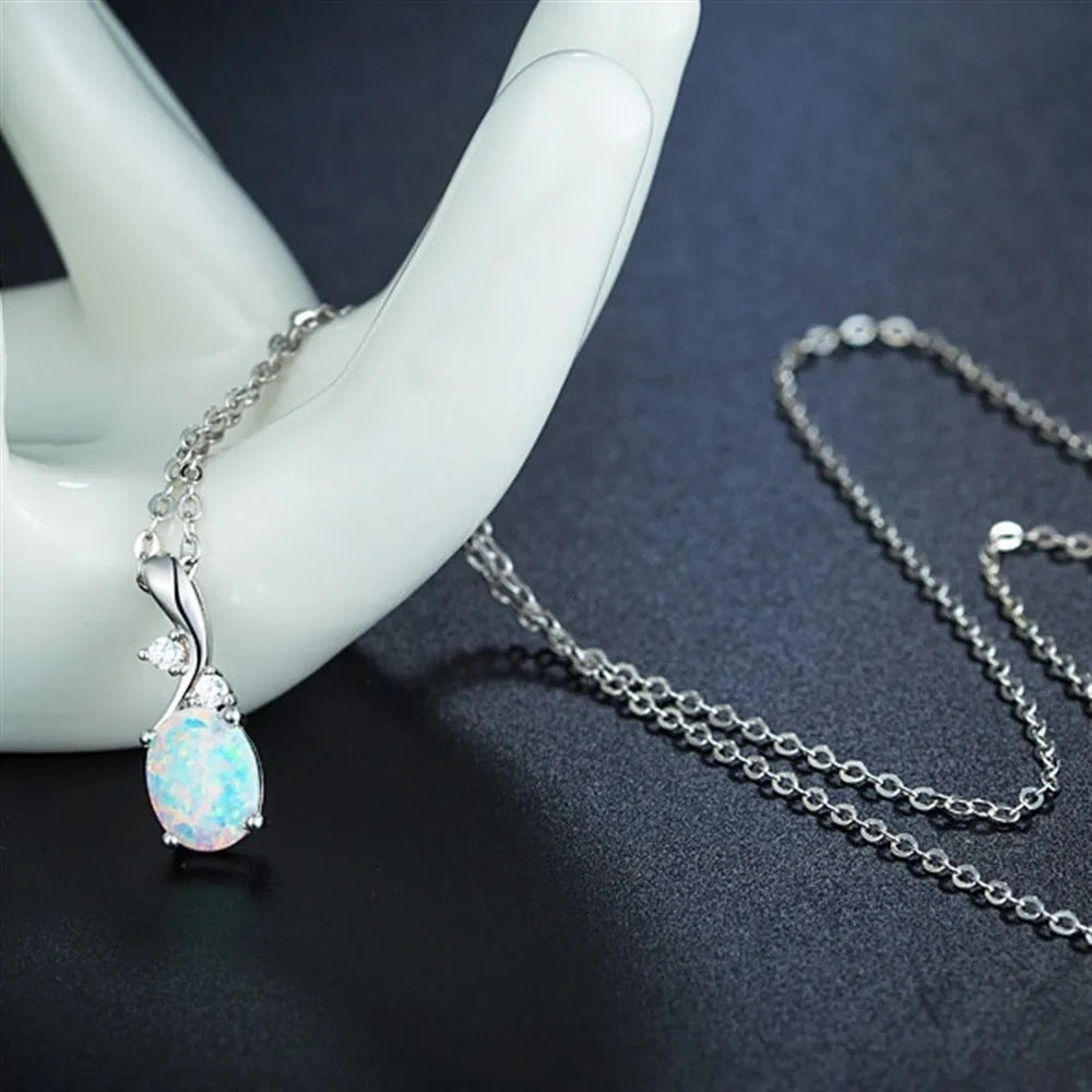 Water drop shaped opal pendant on an adjustable O-shaped electroplated alloy necklace chain