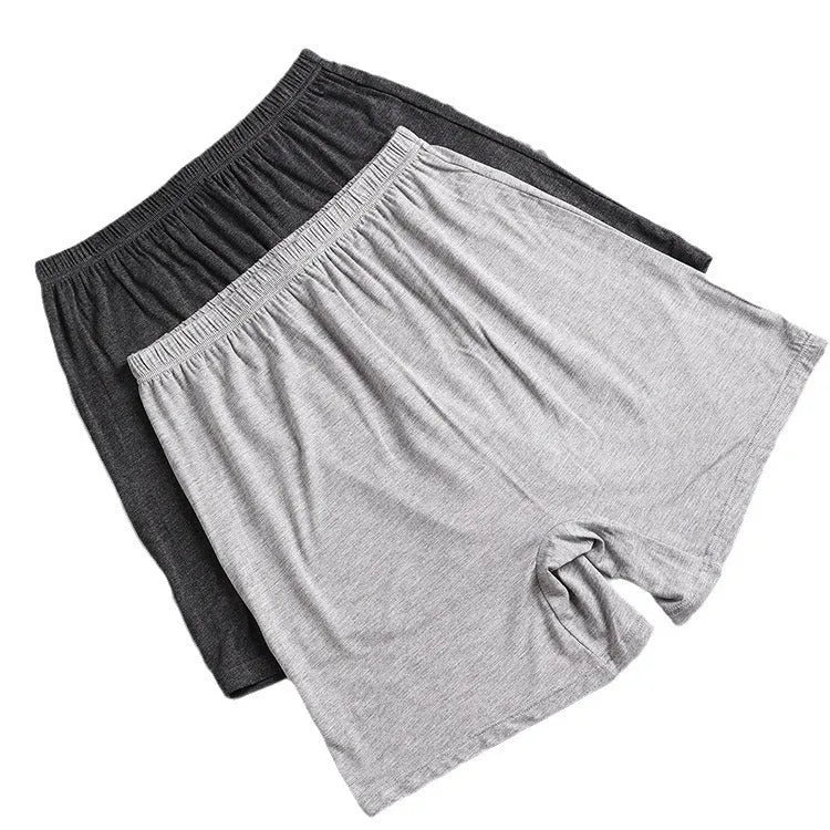 Men's solid colour high-waist boxer shorts in modal fabric, shown in black, on a plain background.
