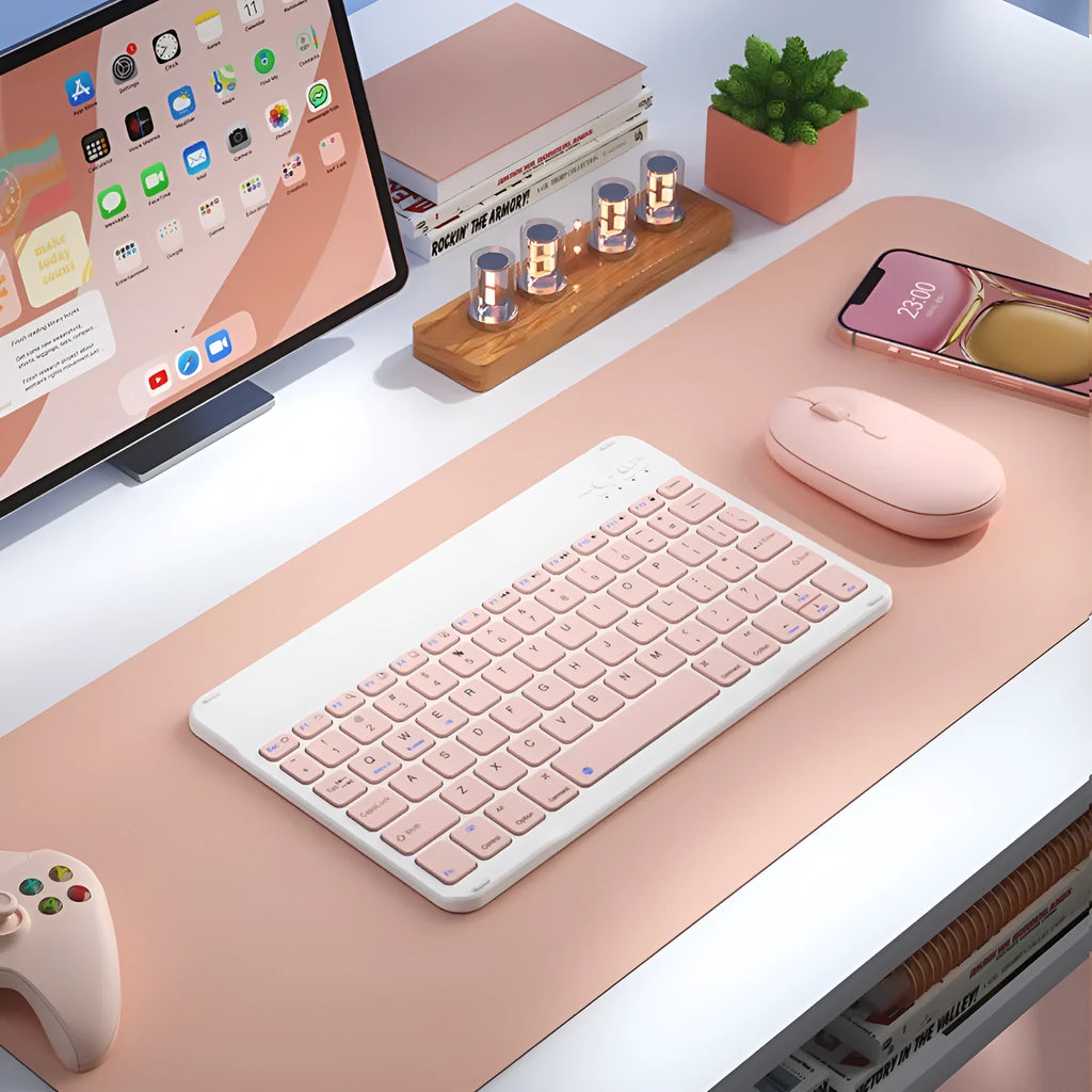Compact white Bluetooth keyboard for tablet and PC use on a wooden desk