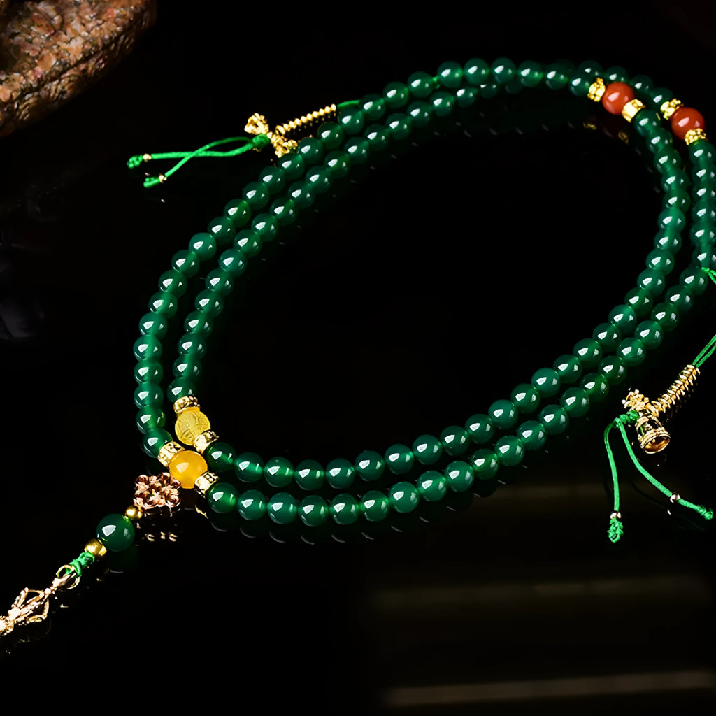 Handmade multi-circle bracelet with green agate beads from Brazil, shown in unisex styling.